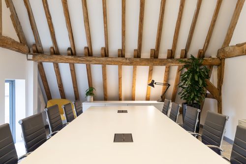 Staff using a workplace booking system in a modern office